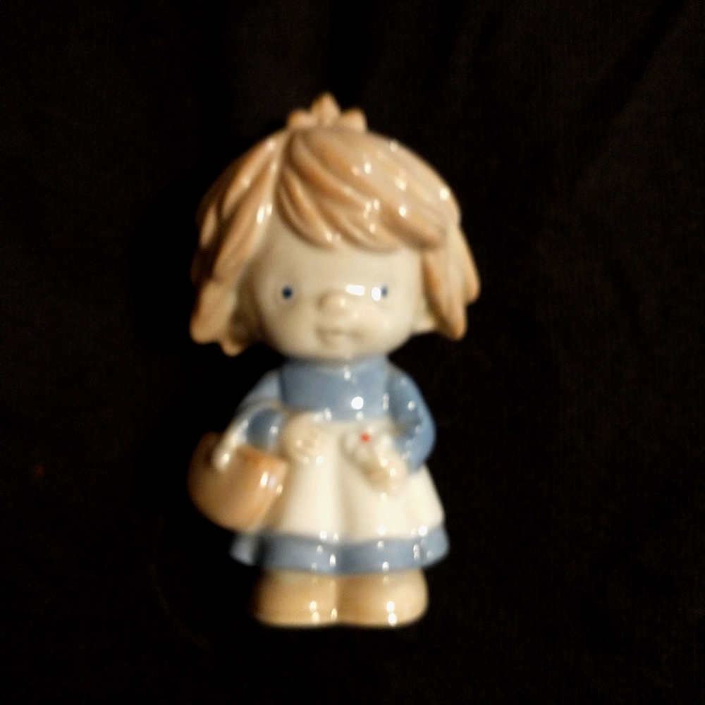 Porcelain "Dreams Collection" Figurines 3 1/4 tall and 1 1/8 wide.